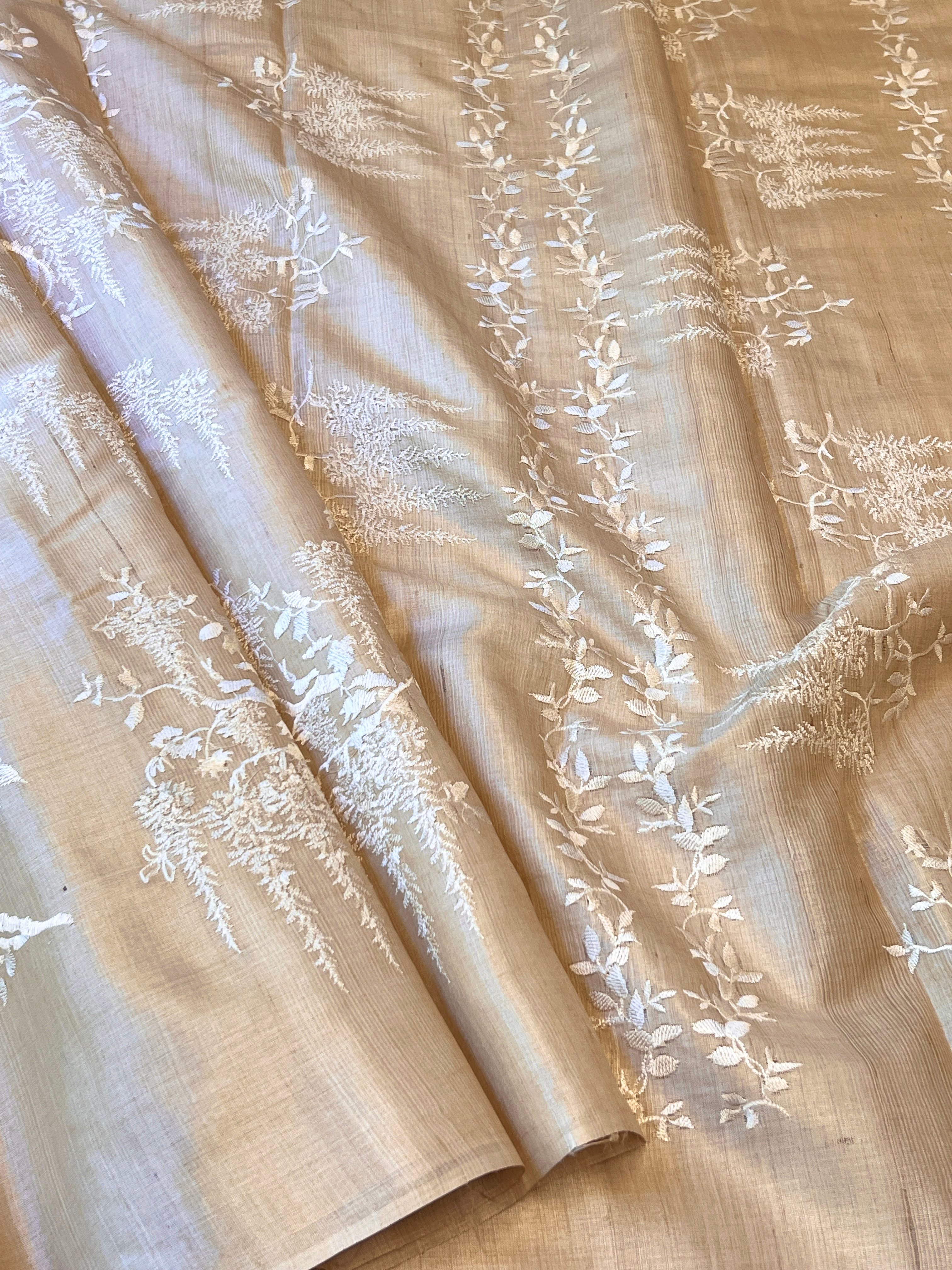 Beige and white embroidered tussar saree