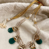 Silver necklace with emerald beads