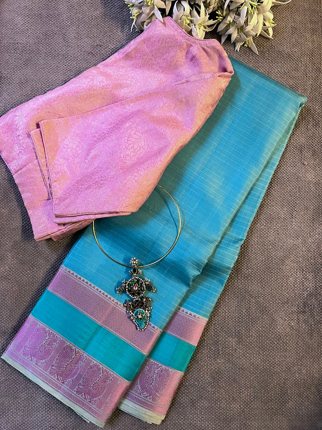 Kimaya turquoise silks saree