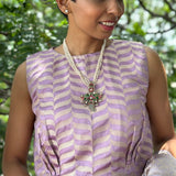 Lilac sleeveless brocade blouse