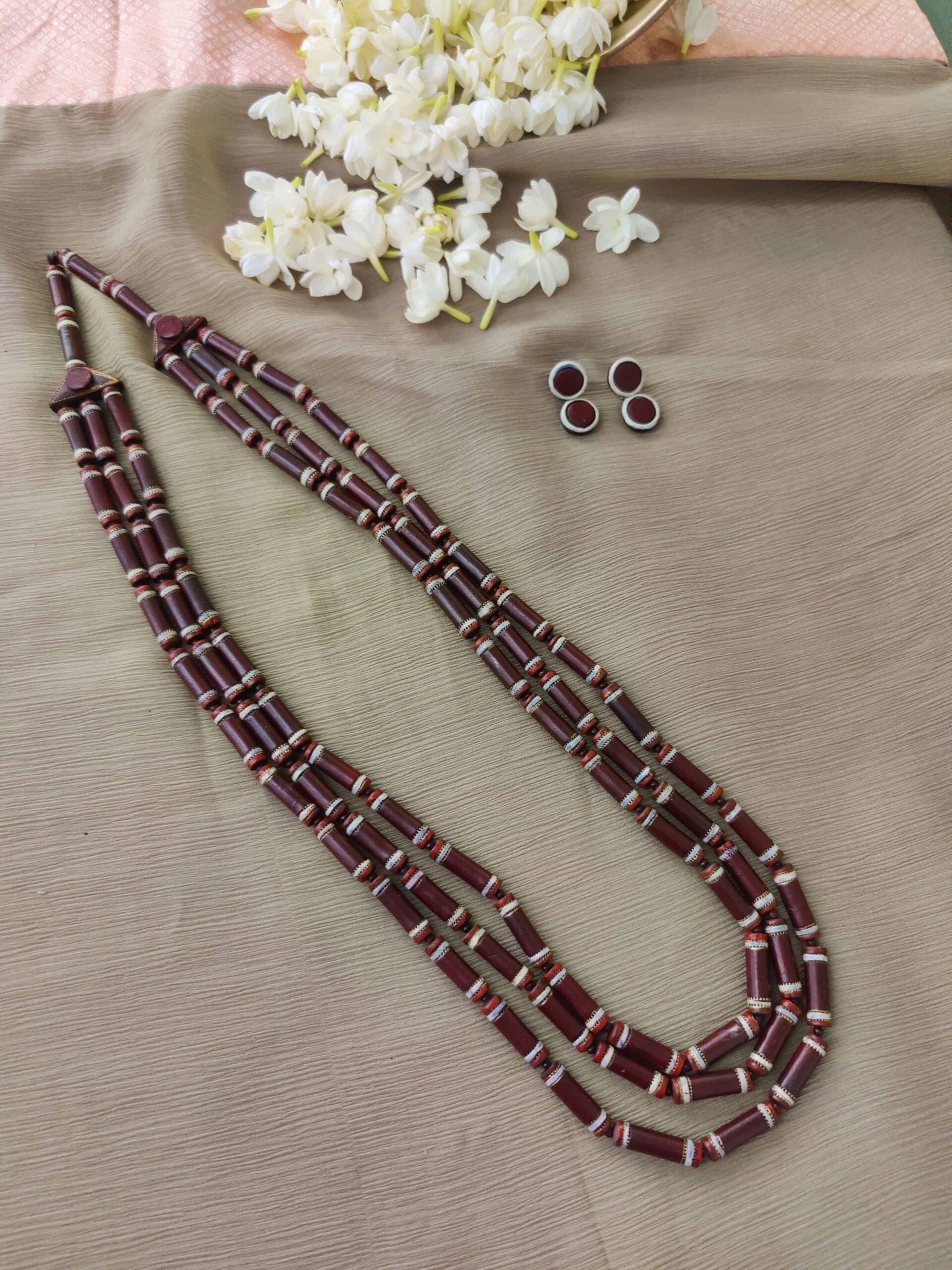 Maroon-and-white-three-layred-handmade-terracotta-necklace-with-earrings-1-1.jpg