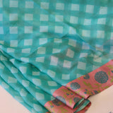 Checked chiffon saree with tussar border