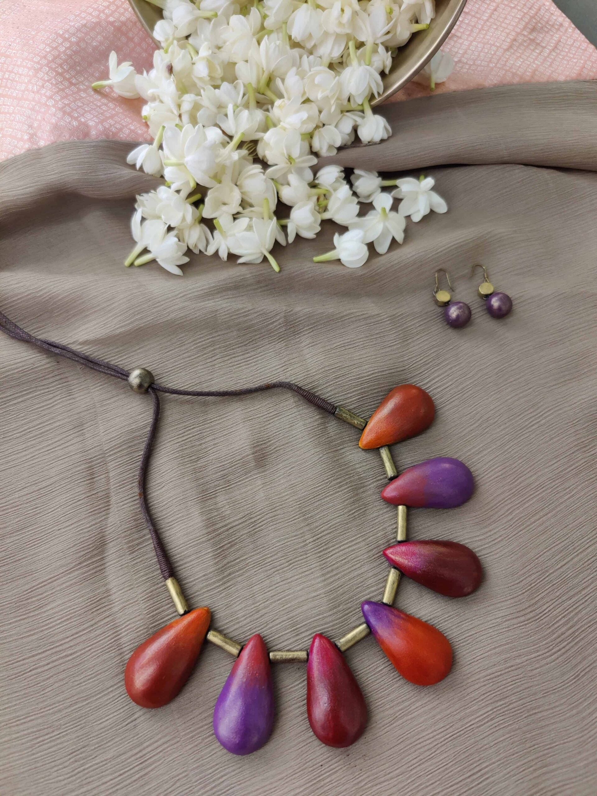 Redorangeviolet-and-magenta-handmade-terracotta-necklace-with-leaf-shaped-design-3.jpg