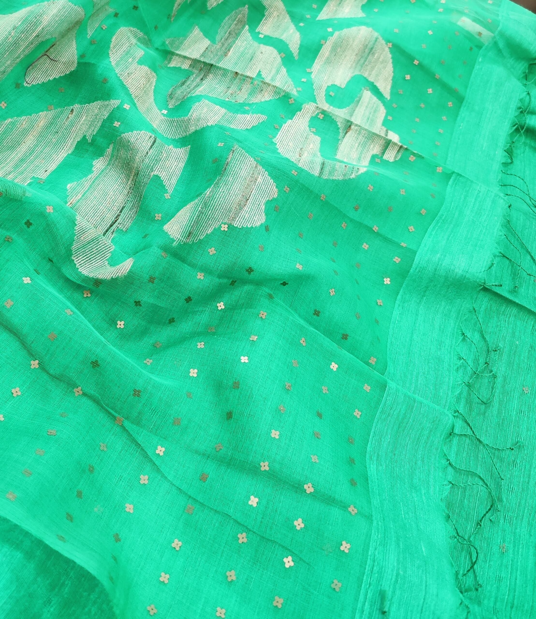 Teal-and-beige-handwoven-Matka-silk-saree-with-sequins-and-floral-on-the-pallu-3.jpg