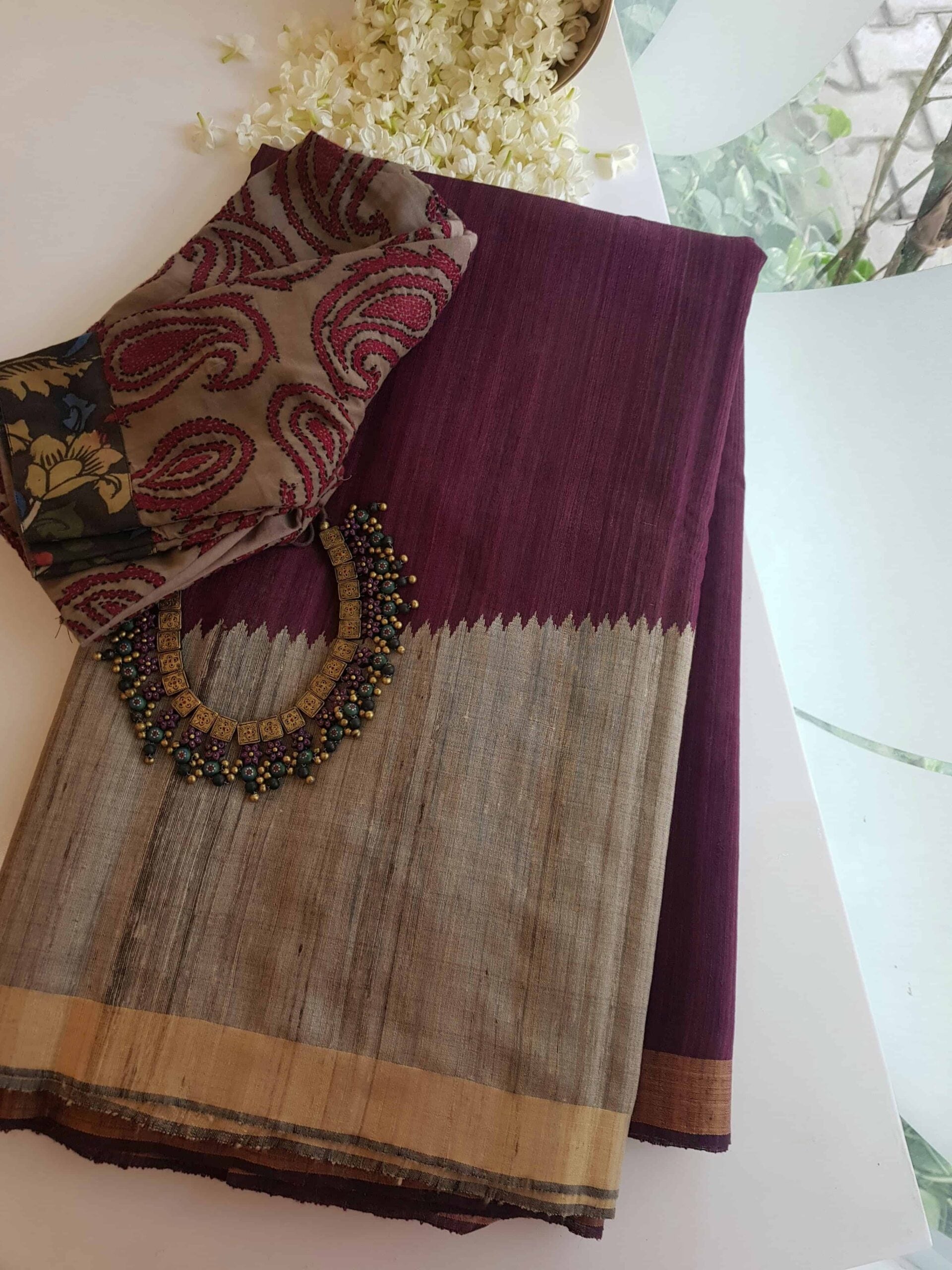 Violet-and-grey-Matka-silk-saree-in-raising-pattern-with-zari-border-and-pallu.jpg