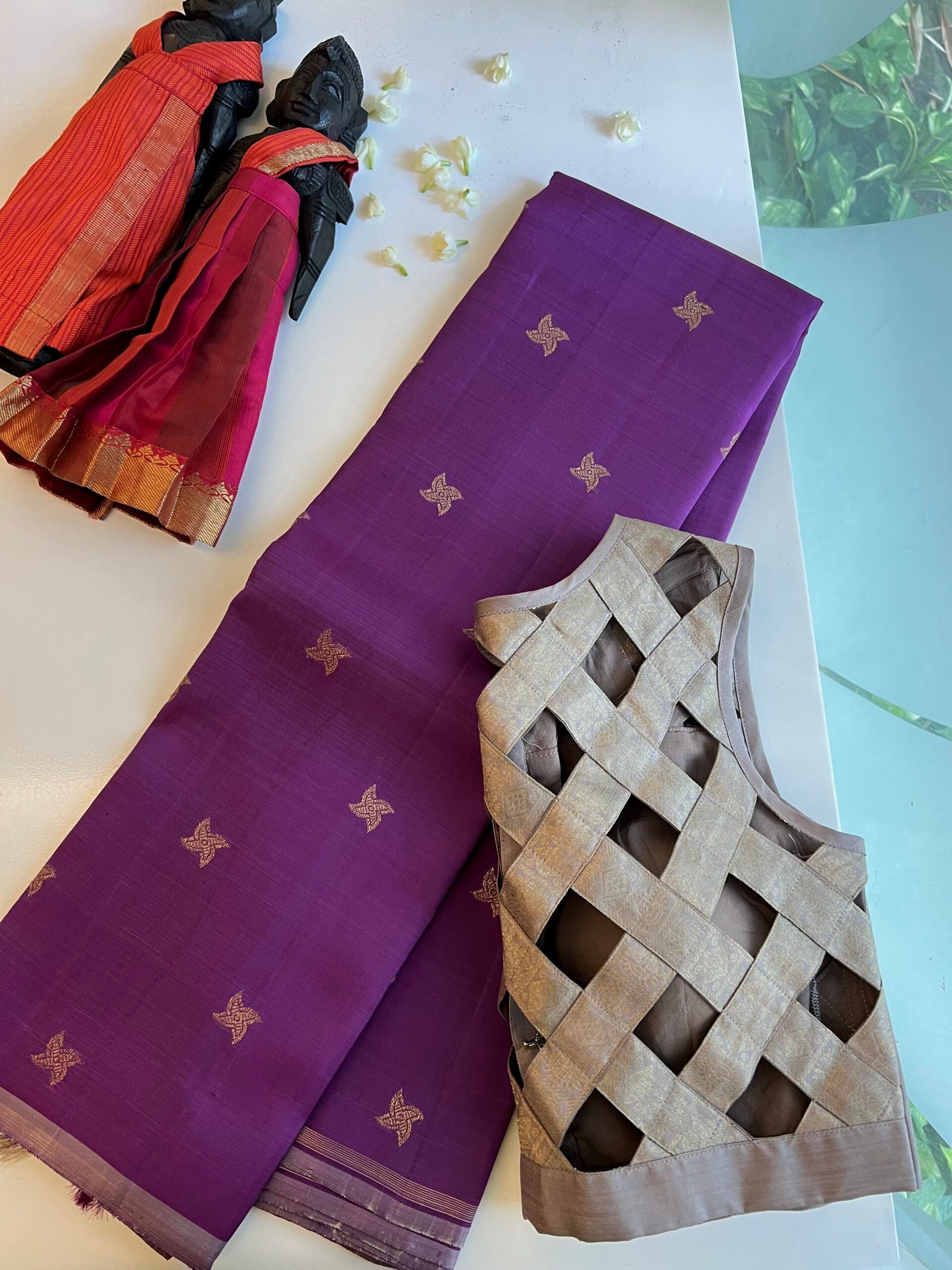 Violet-handwoven-Kanchipuram-silk-saree-with-flower-buttis-1.jpg