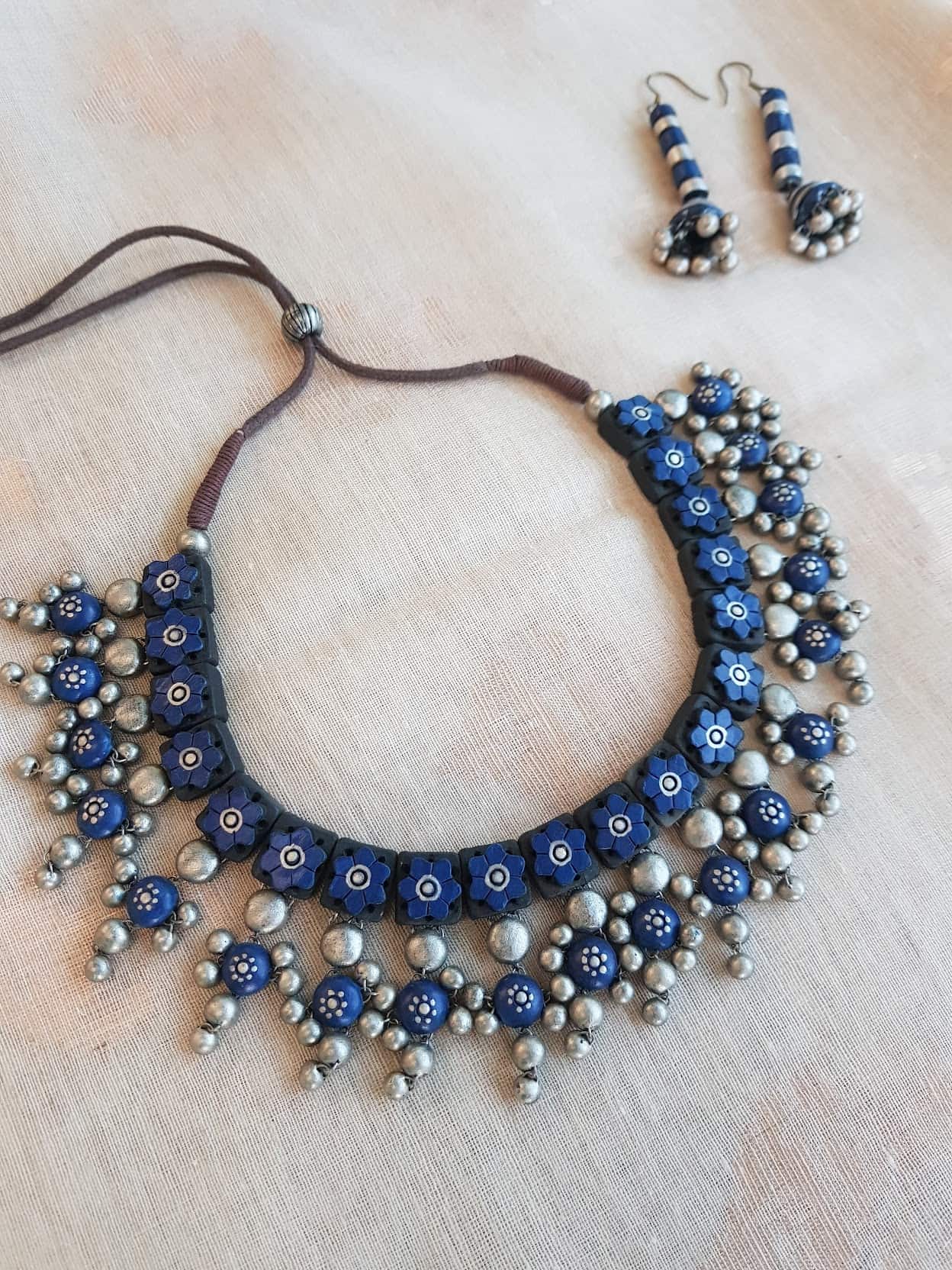 blue terracotta necklace with grey