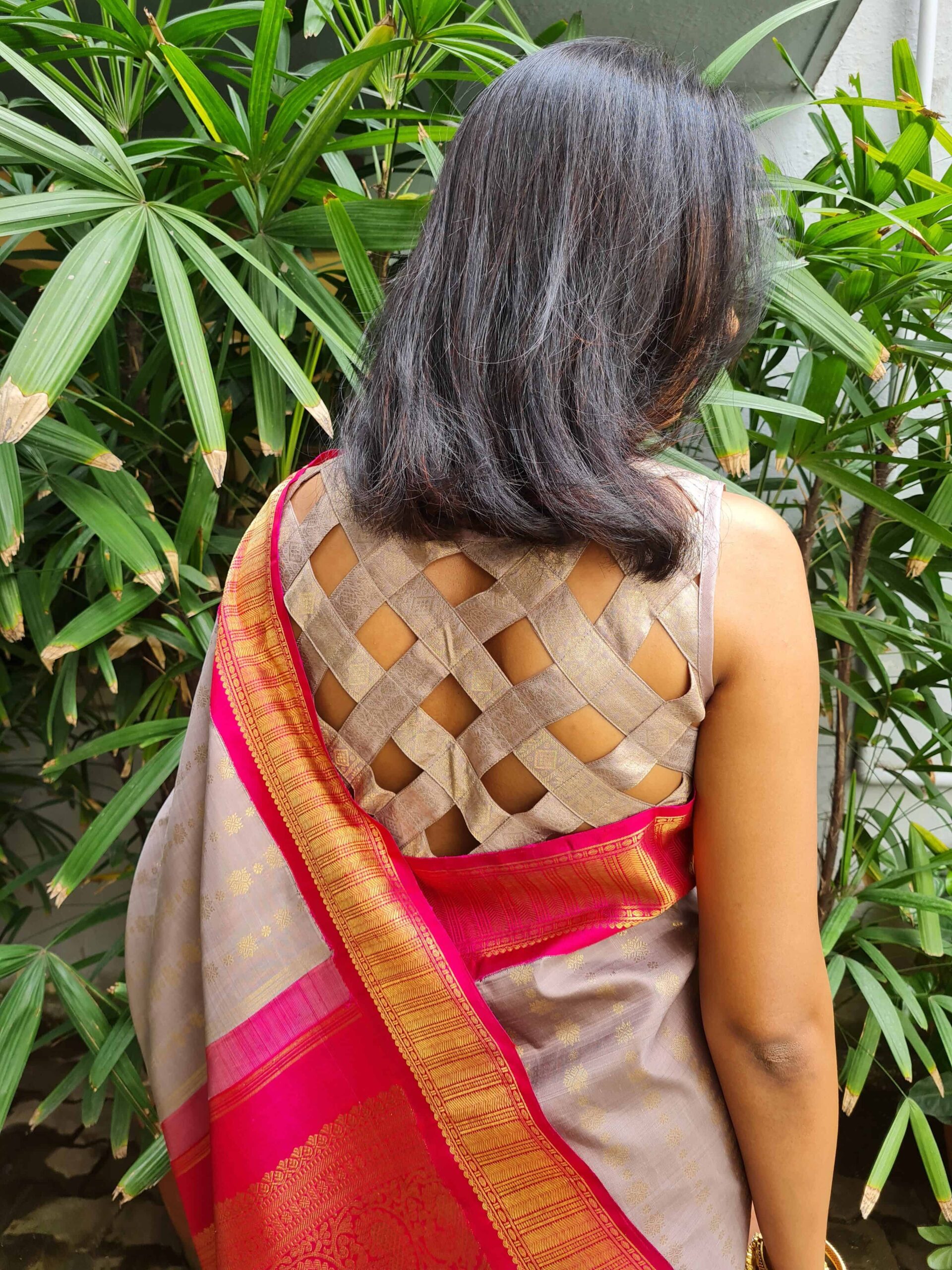 Iced mocha Kanchipuram silk sleeveless blouse with Jhaalar pattern