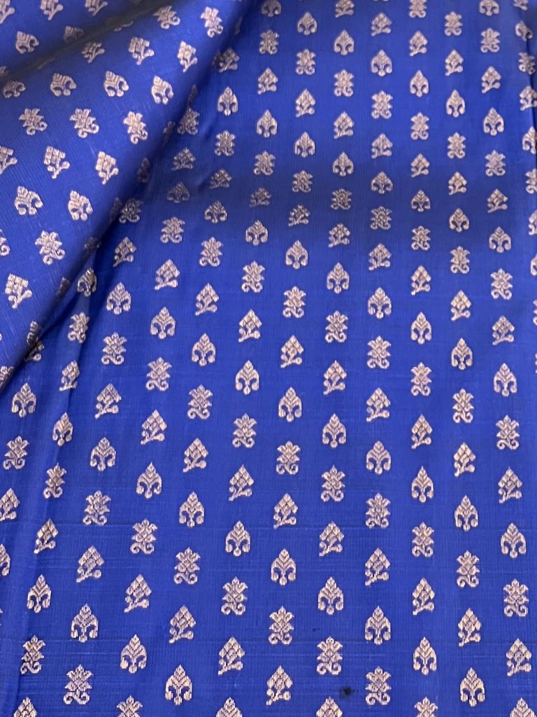 Royal-blue-Kanchi-silk-fabric-with-small-flower-buttis-in-gold-zari-2-1.jpg