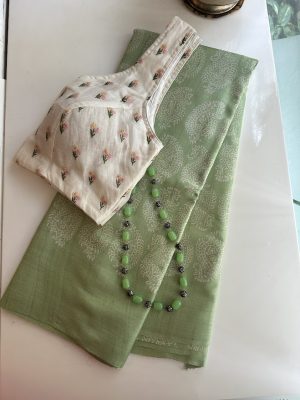 Veena pastel green paisley printed tussar saree