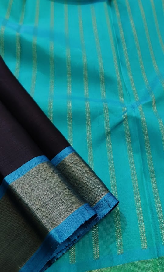 Black kanchipuram silk saree with teal border