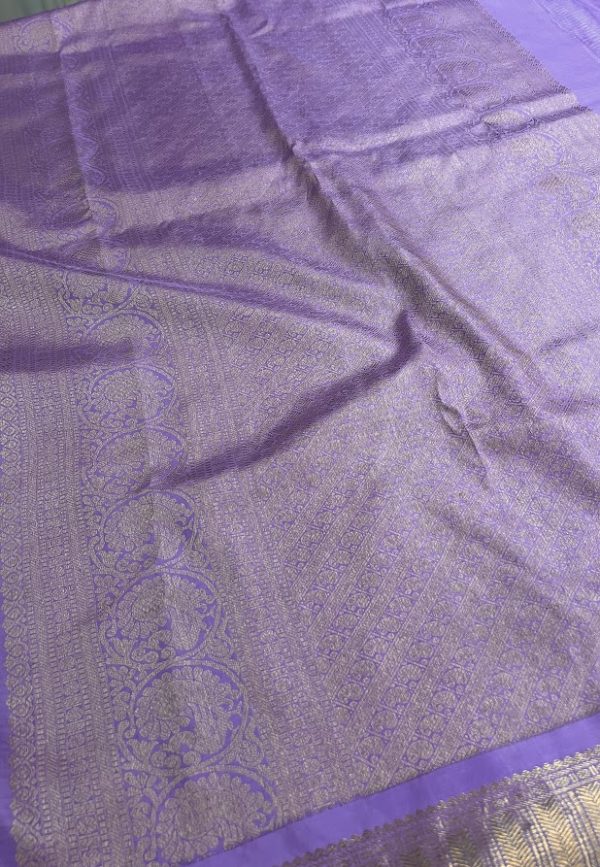 Jivika - lavender Kutch embroidered cream Kanchipuram silk saree