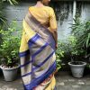 Mishrita- yellow organza silk saree with kucthwork and Kanchipuram silk border