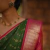 Sumangala Green pink kanchi silk korvai saree 5