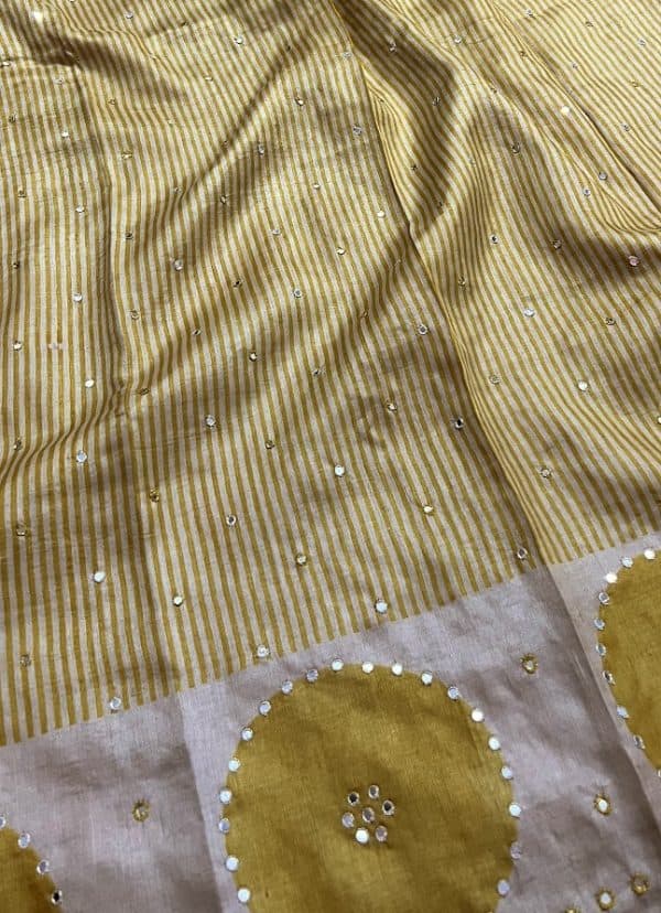 Tashi- yellow beige tussar handprinted saree with mirror work