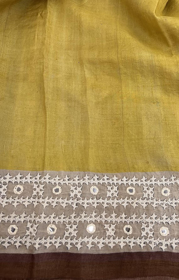 Tushara Mustard handprinted kutch embroidered tussar saree