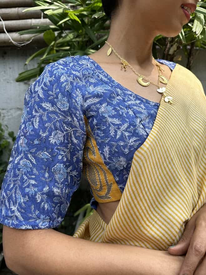 Blue printed kota blouse with mustard accents