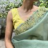 Jhalar Russian green yellow organza cutwork saree