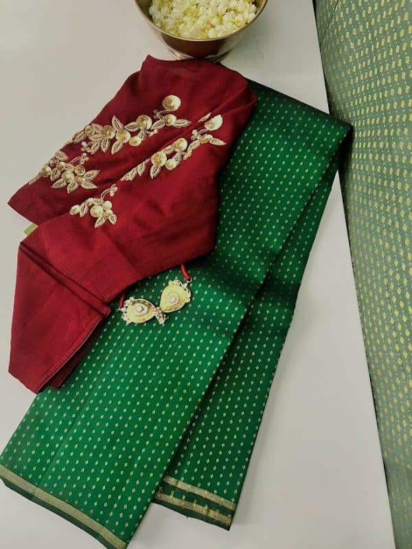 Meera Bottle green kanchipuram silk saree with dual colour pallu