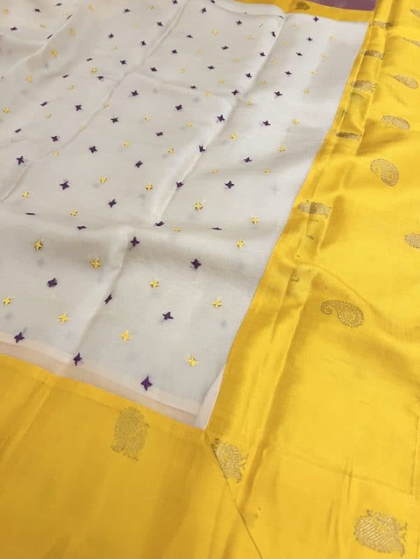 Mishrita Cream organza saree with yellow lilac kanchi silk border
