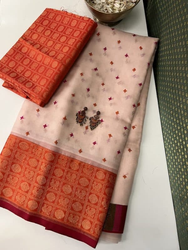 Mishrita Peach organza saree with orange kanchi silk border