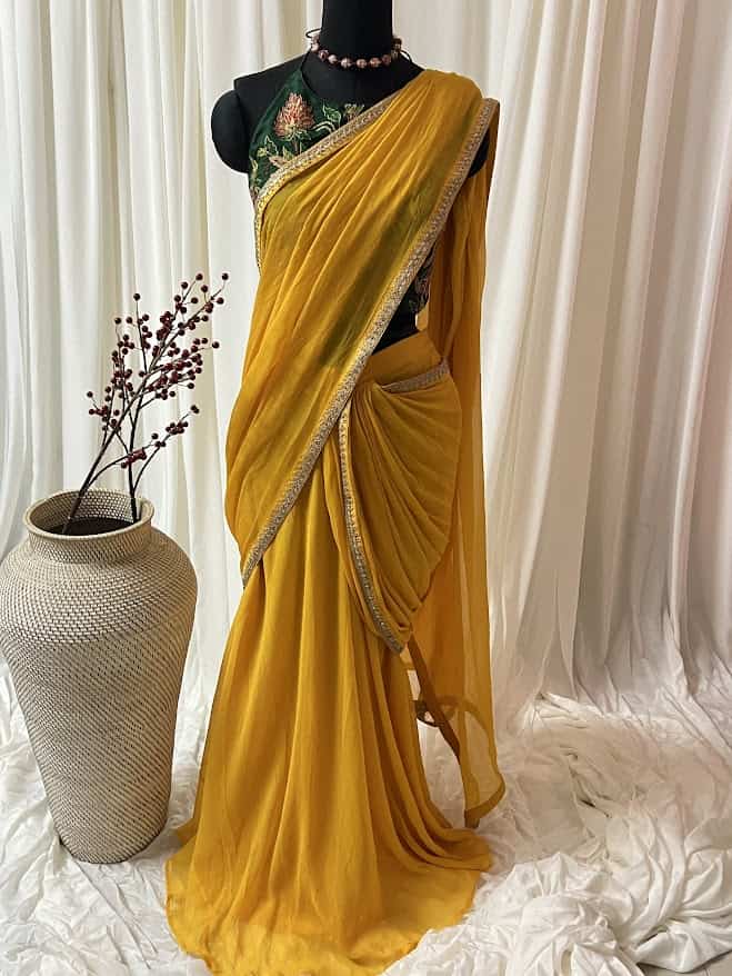 Yellow chiffon draped saree