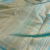 Tejasvi cardamom green blue thread woven kanchi silk saree
