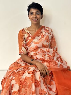 Nisha orange printed organza saree